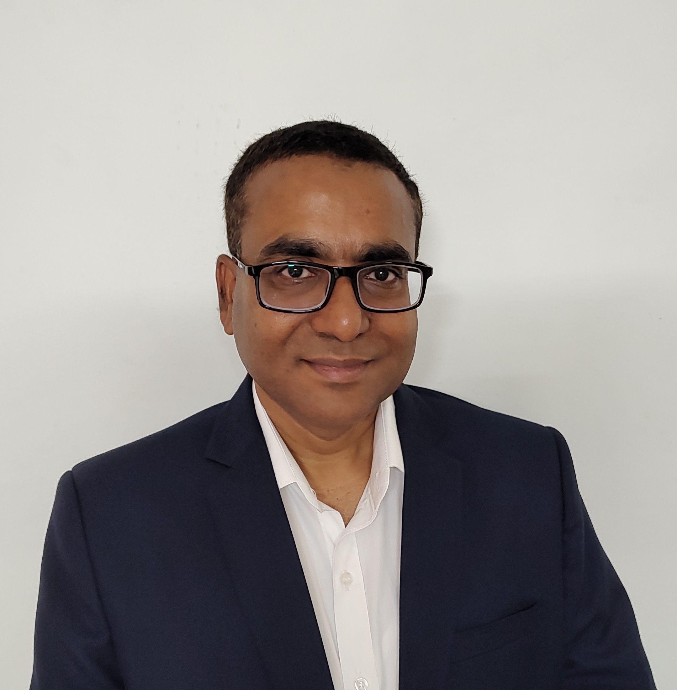 Sadashiv Samantaray, CEO of KABIL, standing confidently and smiling in a professional setting